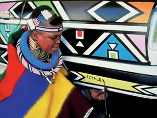 Esther Mahlangu signing BMW Art Car #12, BMW 525i, 1991