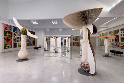 Double Mushroom Circle, 2010; and Revolving Doors, 2004/2019, by Carsten Höller, installation view at Kunsten Museum of Modern Art Aalborg