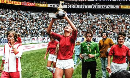 Danish player with the World Cup in a film still from Copa 71