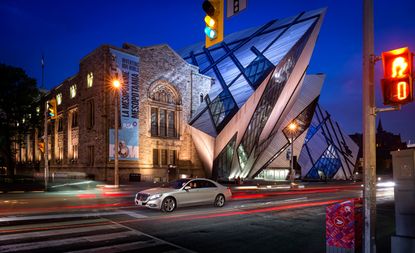 Mercedes-Benz's new S-Class speeds past the Michael Lee-Chin 'Crystal', an extension to the Royal Ontario Museum designed by Daniel Libeskind