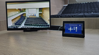 The Extron TouchLink Pro touchpanel in a classroom. 