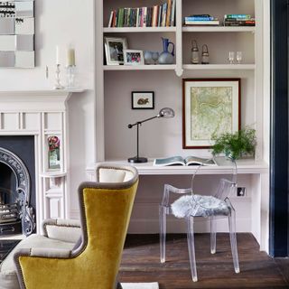 A home office nook in a living room alcove