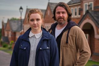 Katherine Pearce and Kieran Bew as Carys and Gareth Jenkins.