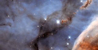 Evaporating Blobs in Carina Nebula