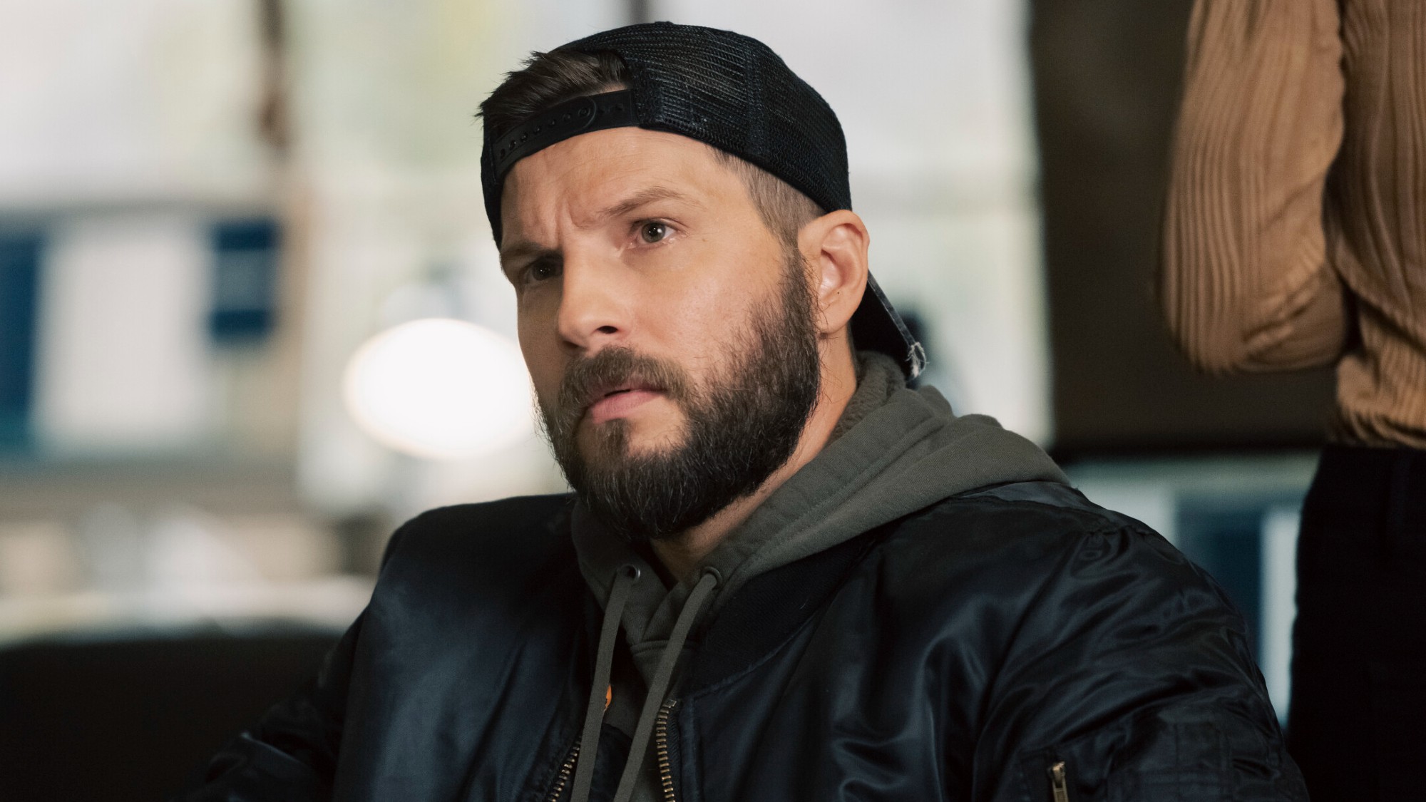 Logan Marshall-Green as Pete Calvin looking up and a bit concerned in Marshals. 