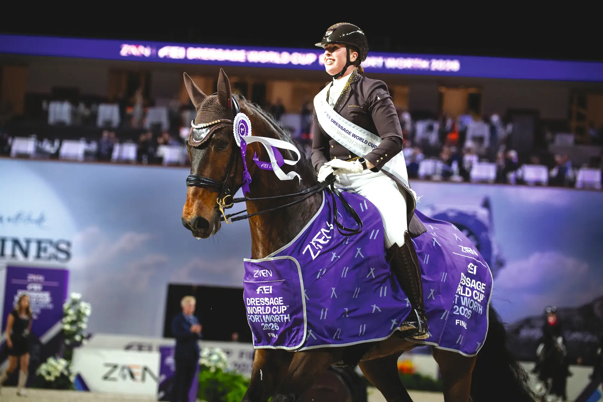 Becky Moody riding Jagerbomb on a lap of honour at the World Cup Final