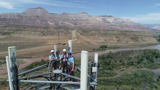 FCC chairman Ajit Pai joins an EasTex Tower crew to climb a 131-foot tower near De Beque, Colo. 