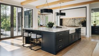 black and white kitchen with large kitchen island