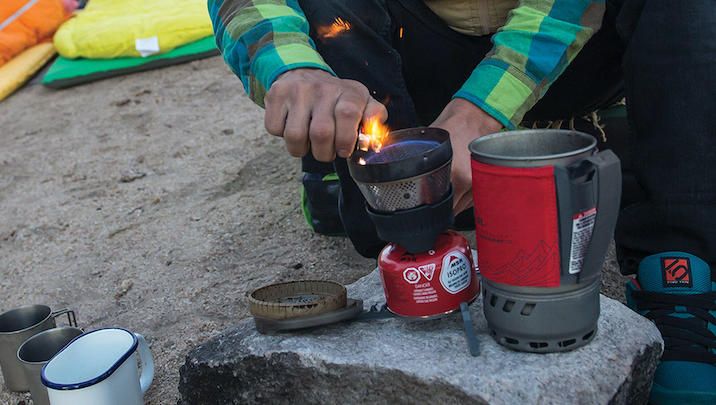 Jetboil vs MSR Windburner: man lighting the MSR Windburner