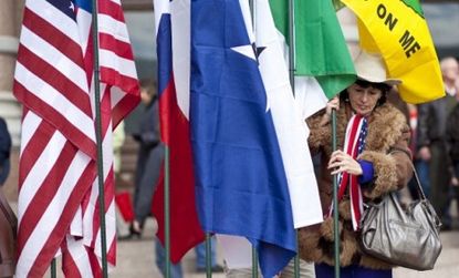 A Tea Party member holds a flag during a January rally in Texas.