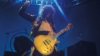 Jimmy Page performs onstage with Led Zeppelin at Earl's Court in London in 1975