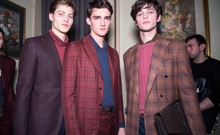 3 male models in colourful suit jackets