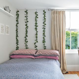 trailing plants above bed