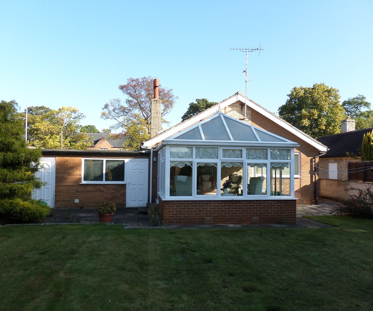 rear view of an old bungalow before a renovation