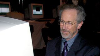 Steven Spielberg looking at a PC.