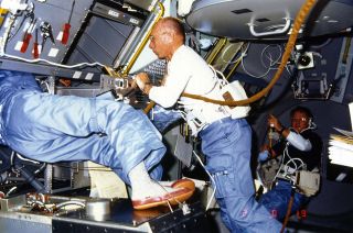 NASA astronaut William Thornton, STS-51B mission specialist, works inside the Spacelab module aboard space shuttle Challenger in 1985.