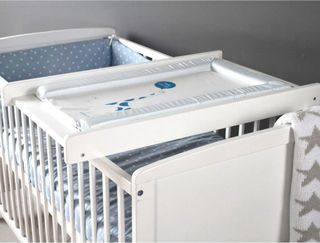 best portable changing table: Dunelm cot top changer