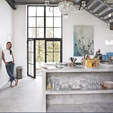 kitchen with concrete surfaces and stairs