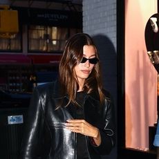 Hailey Bieber wearing a black leather jacket in NYC
