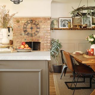 neutral dining room with island and dining table