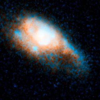 This view of the host galaxy for the kilonova gamma-ray burst GRB 130603B was captured by the Hubble Space Telescope on June 13, 2013.