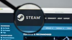 A magnifying glass on top of the Steam logo in a web browser