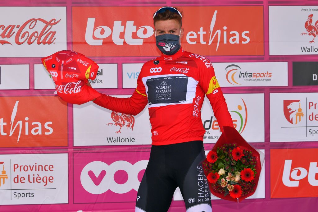WAVRE BELGIUM AUGUST 17 Podium James Fouche of New Zealand and Team Hagens BermanAxeon Red Best Young Jersey Celebration Flowers Covid safety measures during the 41st Tour de Wallonie 2020 Stage 2 a 1723km stage from Frasnes Lez Anvaing to Wavre TourdeWallonie TRW2020 on August 17 2020 in Wavre Belgium Photo by Luc ClaessenGetty Images