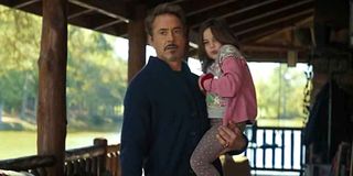 Tony Stark carries daughter Morgan Stark on porch in Avengers: Endgame
