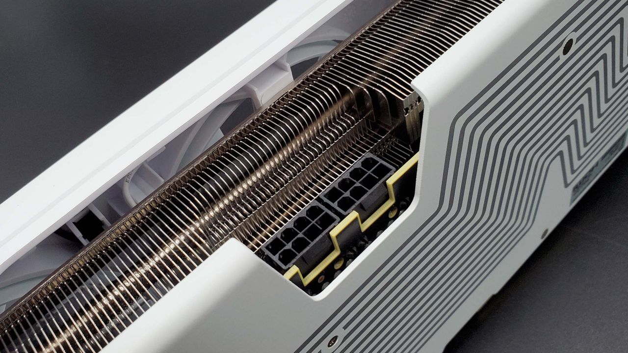 XFX Swift Radeon RX 9070 OC graphics card on a grey background with a gradient