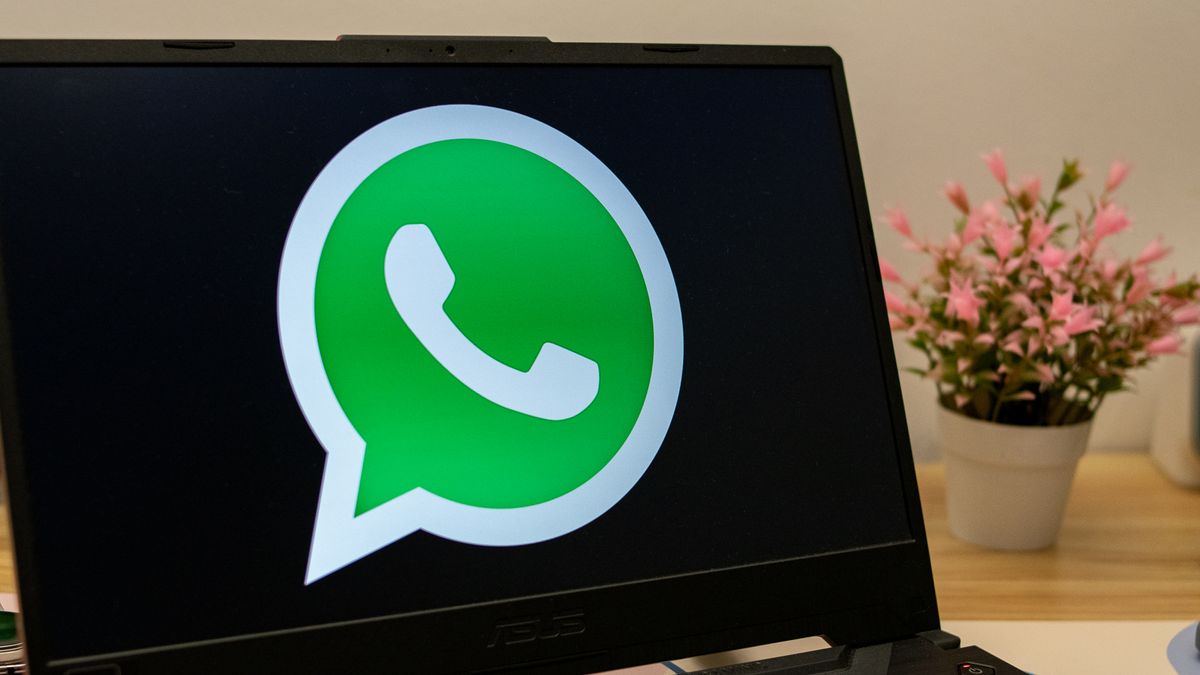 Whatsapp desktop app logo on a laptop screen