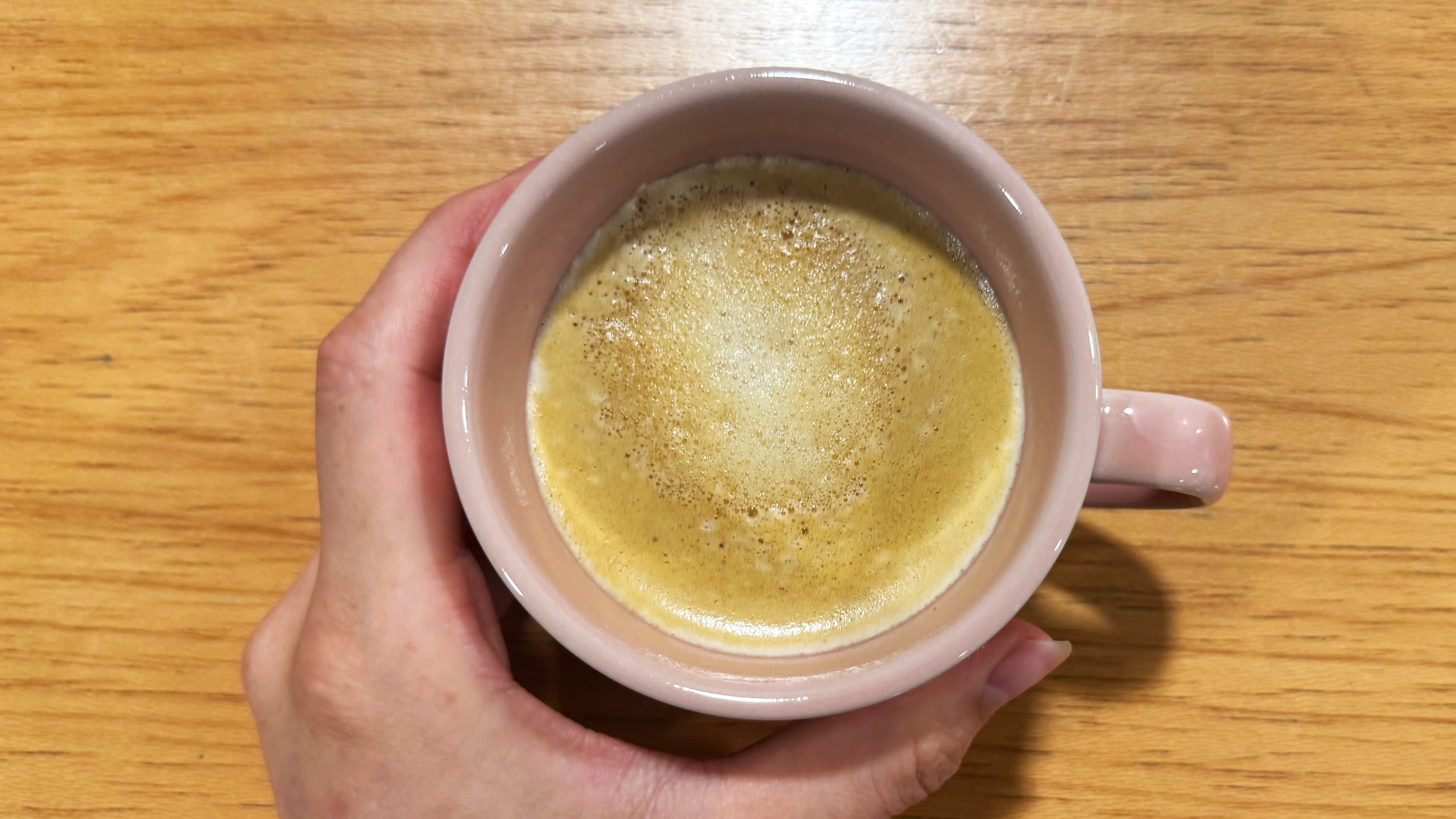 a photograph of a coffee made by the Jura E8 automatic coffee machine