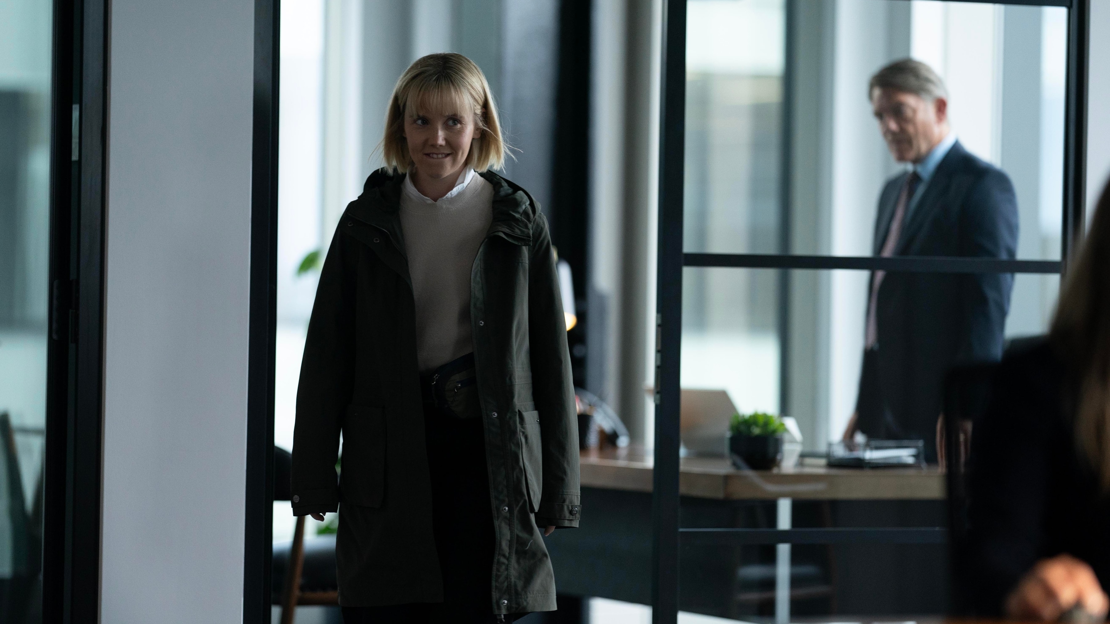 Karen Pirie walking away from Fergus's office as Fergus looks at her.