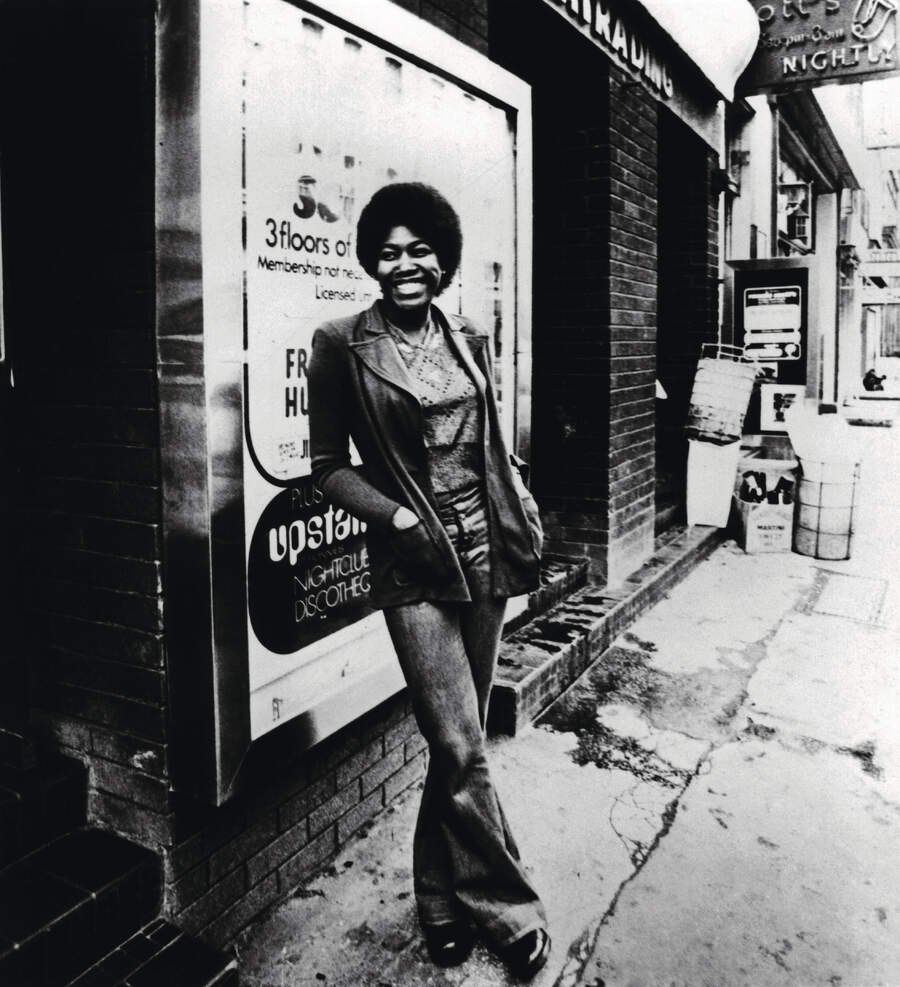 Joan Armatrading outside Ronnie Scott's nightclub, London