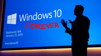 Windows 10 launch event screen with shadow of presenter in front of it