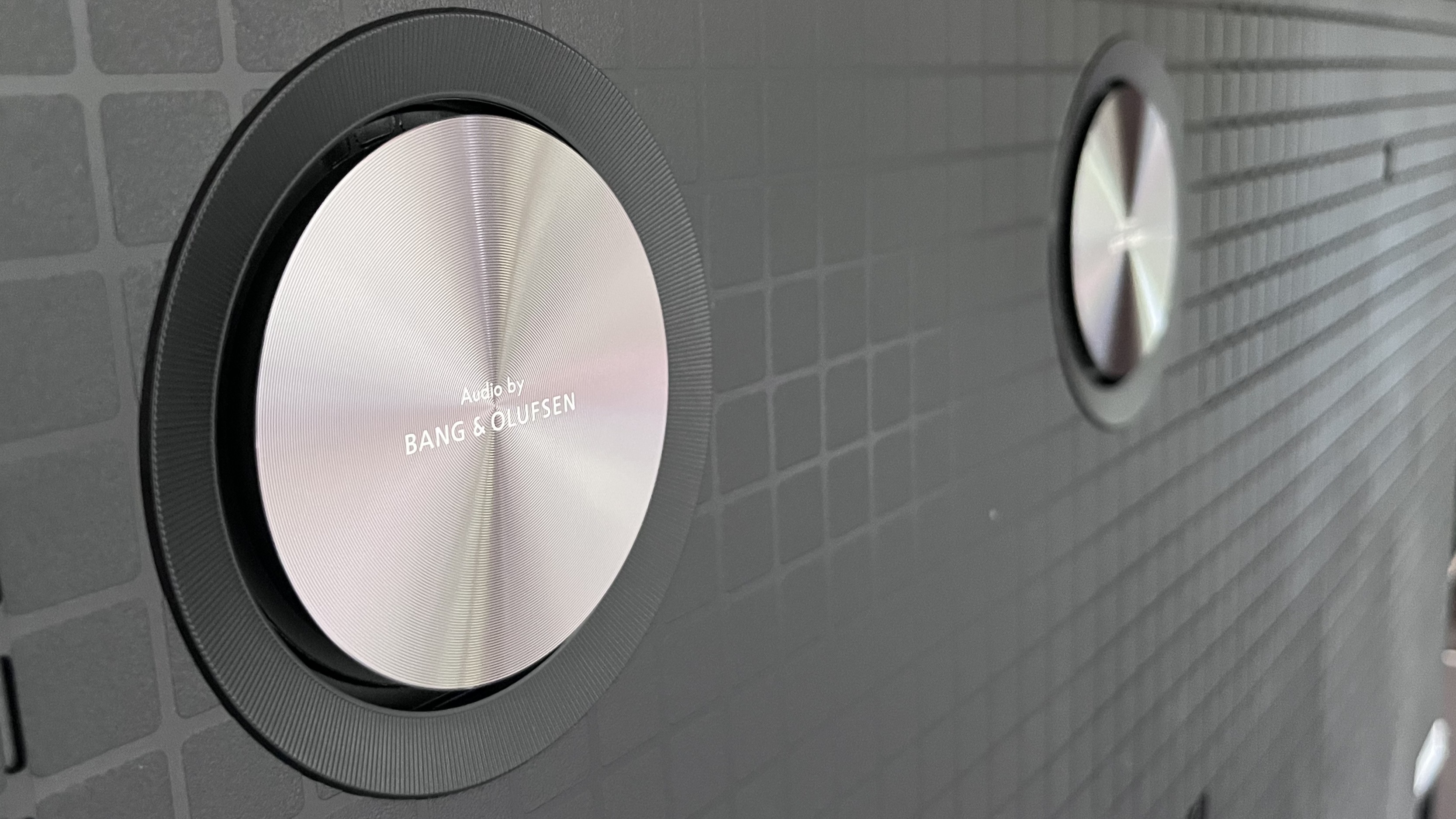 TCL QM9K rear panel subwoofer drivers