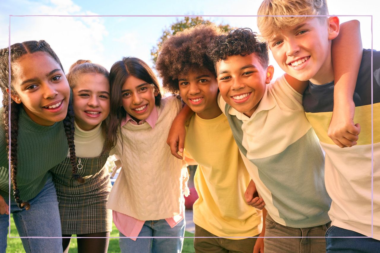 Group of tween smiling at the camera