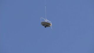 NASA's inflatable flying saucer, called the Low-Density Supersonic Decelerator, lifts off on the second test flight of Mars landing technologies on June 8, 2015. The inflatable decelerator also includes the largest supersonic parachute ever made by NASA.