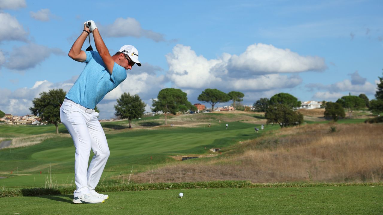 Lucas Herbert takes a tee shot during the 2022 Italian Open