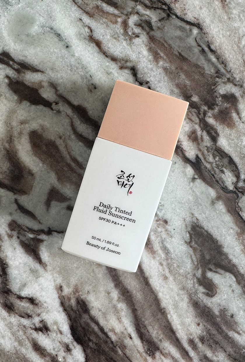 A photo of beauty of joseon tinted spf on a marble table