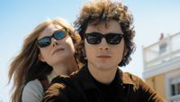 (L-R) Elle Fanning as Sylvie Russo and Timothée Chalamet as Bob Dylan as "A Complete Unknown"