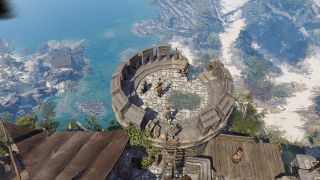 Looking out across a seaside coast from a ruined watchtower in Divinity: Original Sin 2.