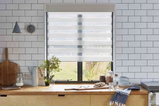 Bloc white and clear kitchen blind in metro tiles kitchen with large windows