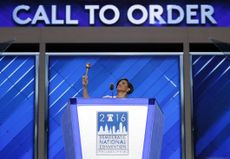 Baltimore Mayor Stephanie Rawlings-Blake raises the gavel as she calls the convention to order.
