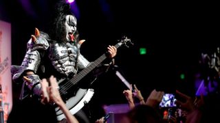 A photo of Gene Simmons on stage with Kiss