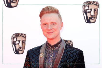 A close up of Owain Wyn Evans at the BAFTAs