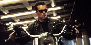 Arnold Schwarzenegger as the Terminator riding motorcycle