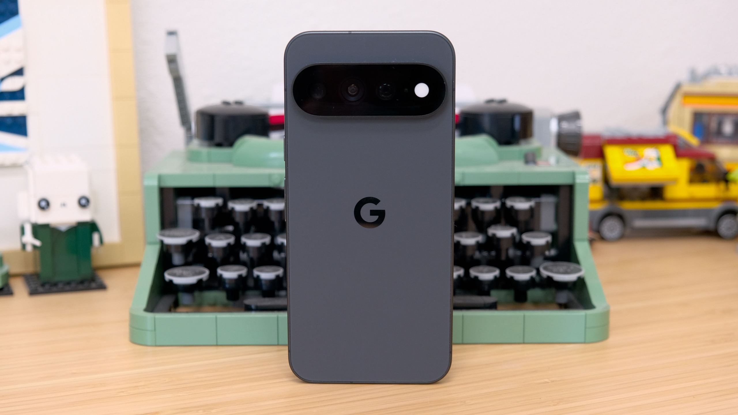 The Google Pixel 11 Pro XL resting on a wooden table