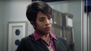 Sheryl Lee Ralph wearing a pink shirt and a black jacket as Barbara in Abbott Elementary.