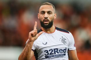 Kemar Roofe celebrates after scoring from his own half for Rangers against Standard Liege, 2020