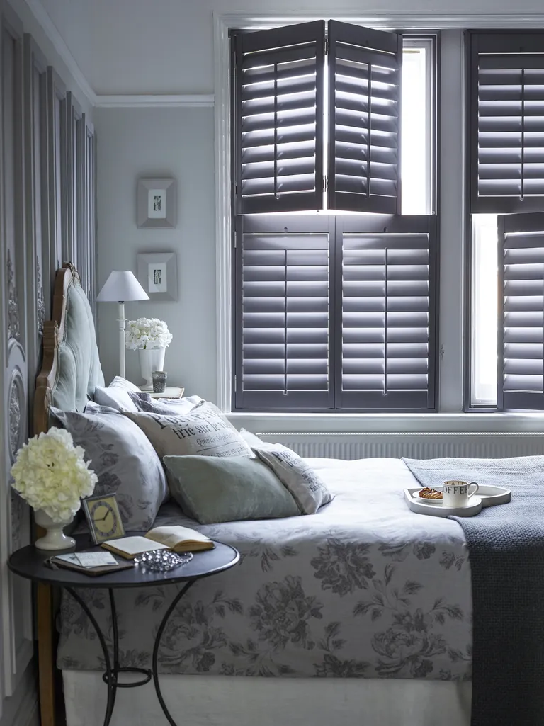 bedroom with plantation shutters
